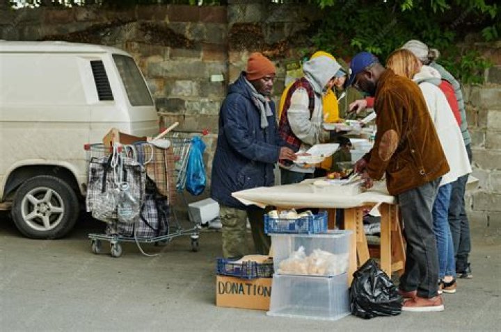 Can I give a homeless person food