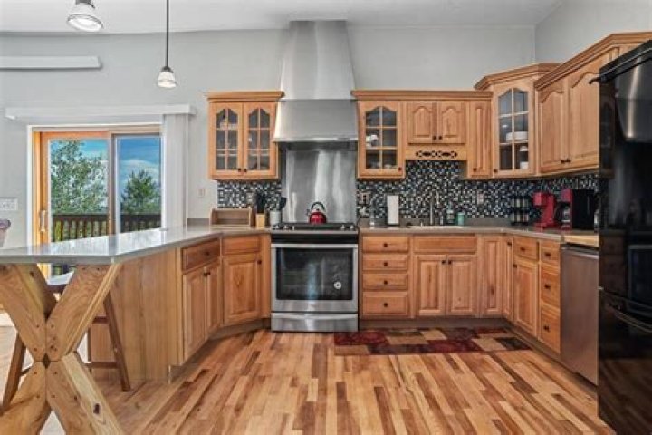 Does kitchen flooring go under appliances
