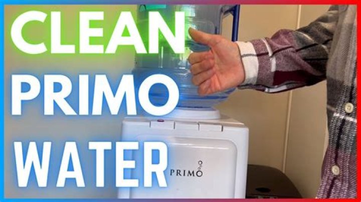How do you clean a bottom loading Primo water dispenser