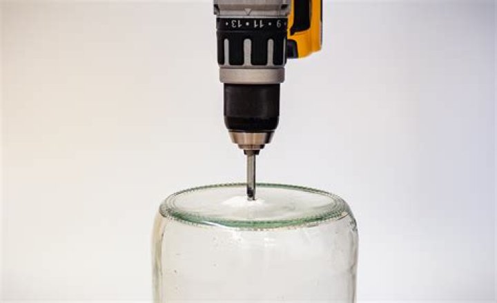 How do you drill large holes in glass