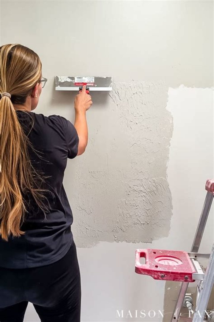 How do you smooth out rough stucco