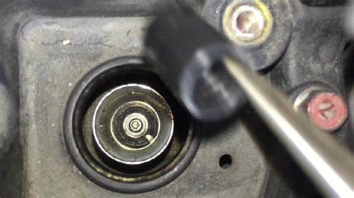 What is a spark plug coil boot
