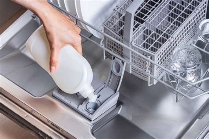 Where do you put liquid detergent in a GE dishwasher