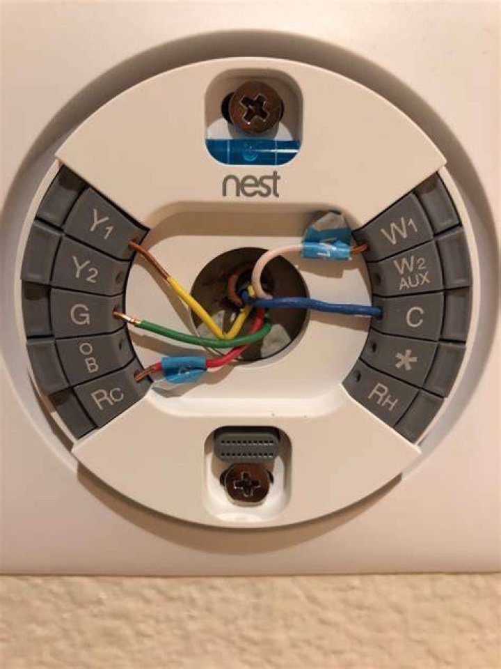 Where does blue wire go on Nest thermostat